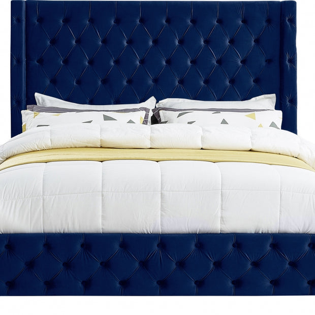 Cama de terciopelo azul sabana